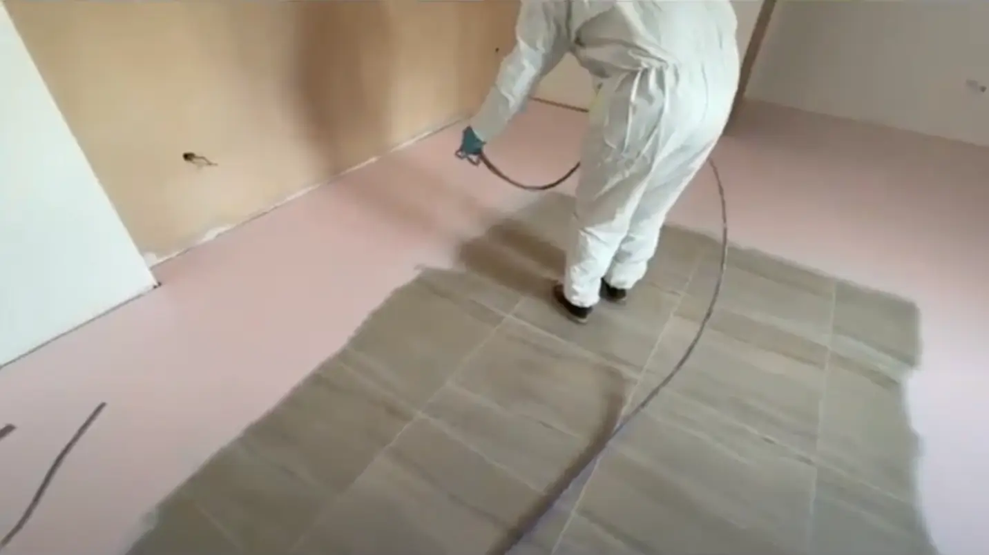 Surface Pro liquid protection coating applied to tiles to prevent scratches, stains, and damage during construction or renovation