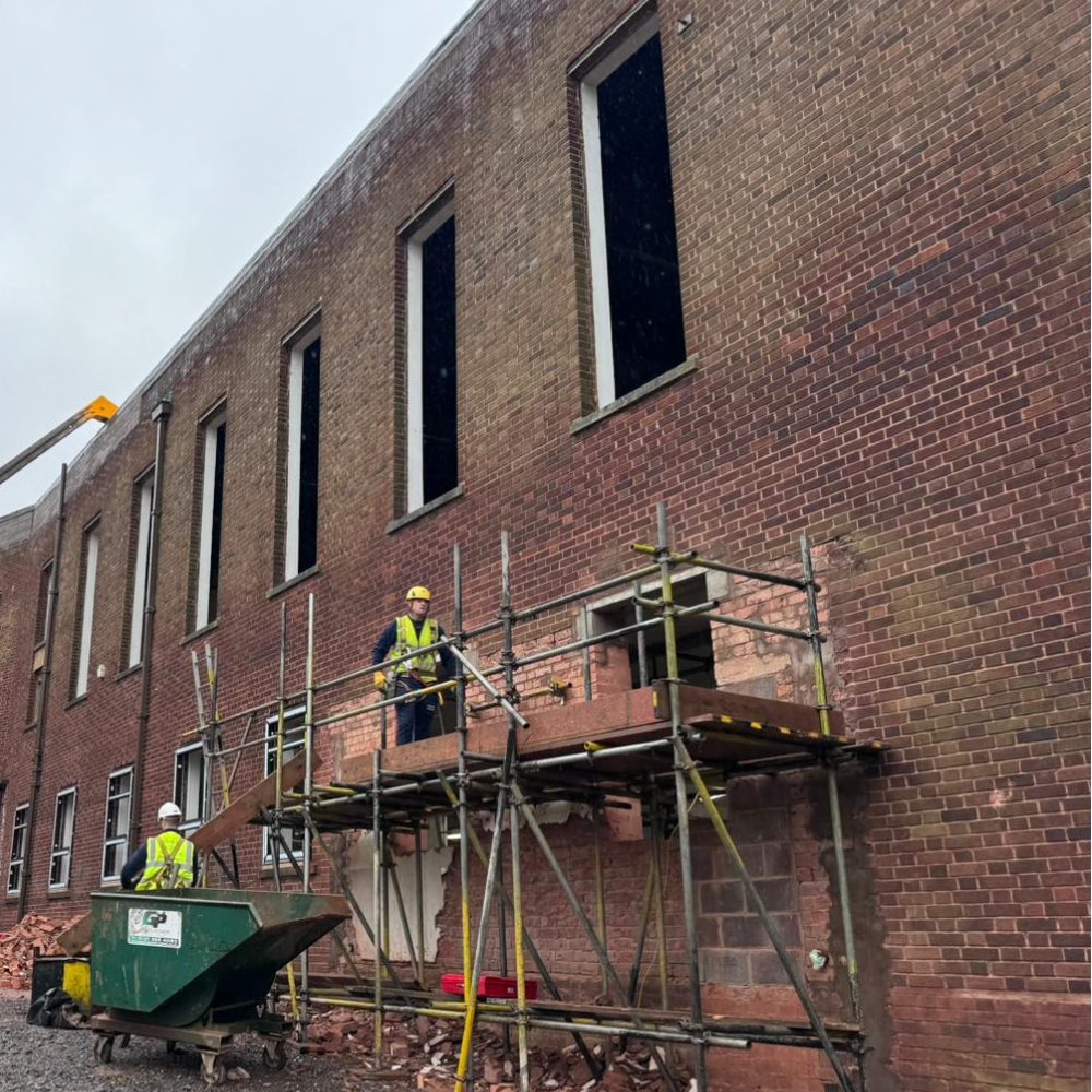 prep work of a building before a new airtight layer is applied