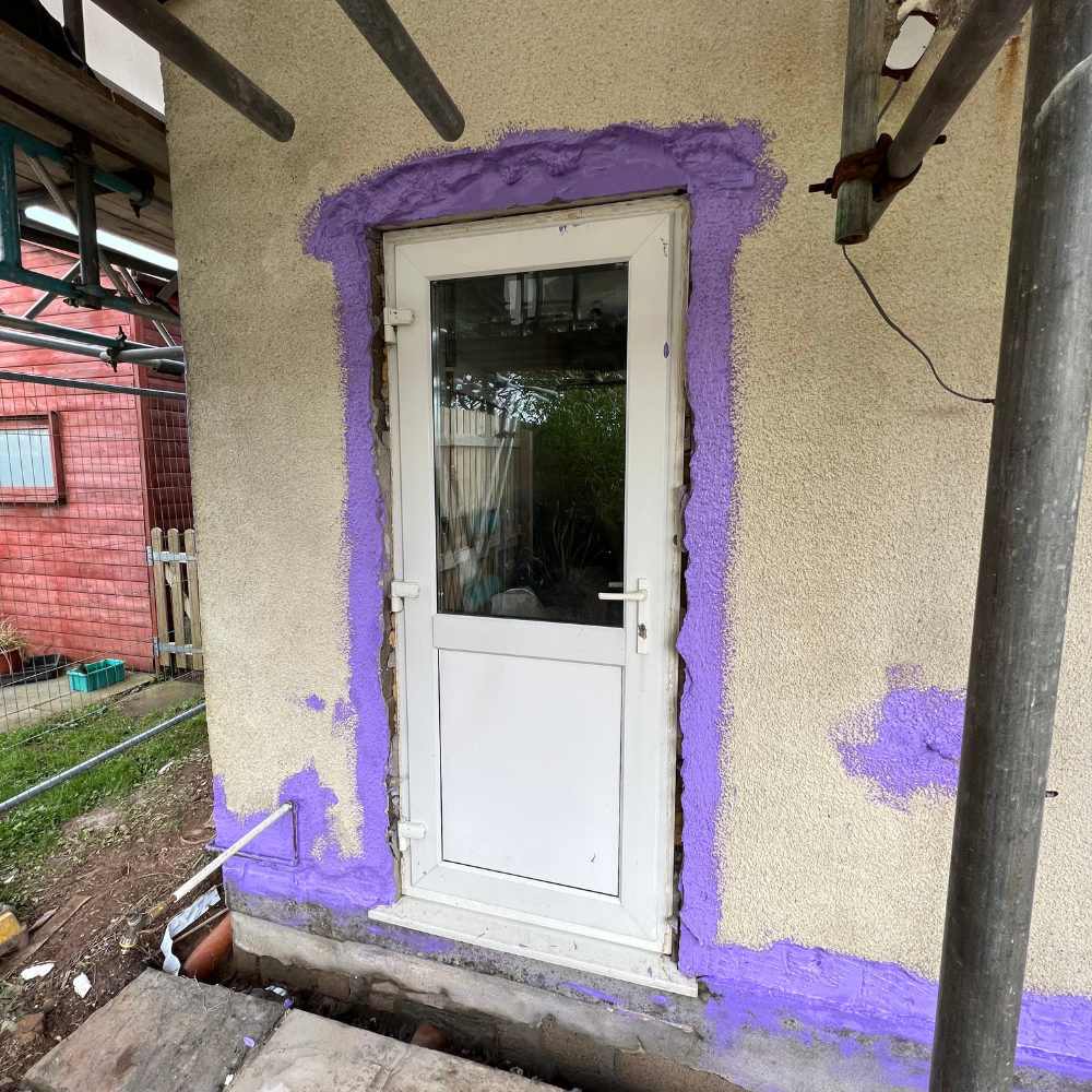 Detailing with Passive Purple Brush to seal gaps and junctions for airtightness in an Oxford retrofit.