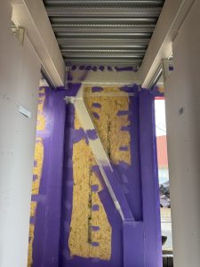 High-performance airtight seal at Bedford Academy with Passive Purple liquid applied coating.