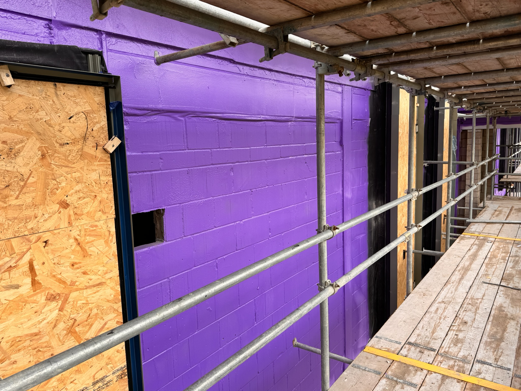Airtight and vapour-tight membrane installation on educational building project.
