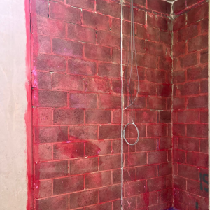 Finished high-performance ICF and blockwork structure using Supergrip primer and Passive Purple for superior airtightness and durability.