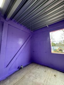 Passive Purple airtight membrane ensuring low air permeability for Bedford Academy construction.